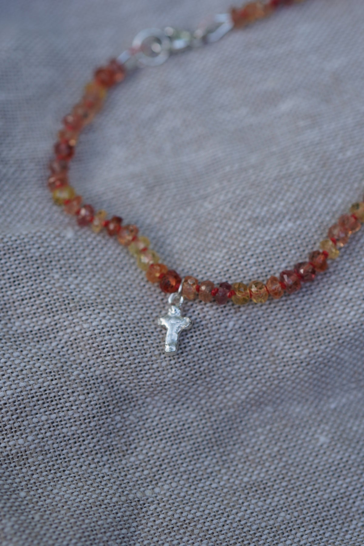 Carry the Cross Bracelet - No. 5 Yellow Sapphire, Red Silk, Sterling Silver 7 Inches