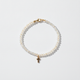 white stone bracelet on white background 