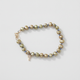 White Background Green pearl bracelet with blue silk knots
